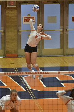 Kendra Lukacs jumps up to serve the ball. She finished with one service ace.