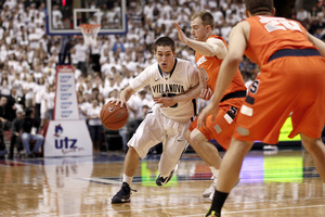 Villanova guard Ryan Arcidiacono drives to the hoop against Syracuse guard Trevor Cooney.