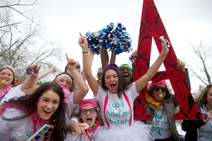 Alpha Gamma Delta sisters celebrate new member recruitment outside of Schine Student Center Sunday afternoon. Recruitment took place during the last two weekends, in which about 900 women met with sisters of the 11 Panhellenic sororites at Syracuse University. 



