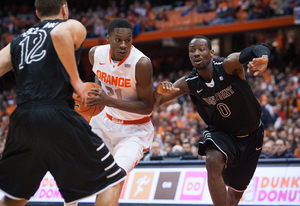 Tyler Roberson drives through the High Point defense. Roberson didn't make a shot against the Panthers in 11 minutes.