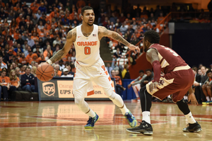 Michael Gbinije scored 14 points and committed no turnovers in Syracuse's 62-40 drubbing against Boston College. The win was SU's first during conference play. 