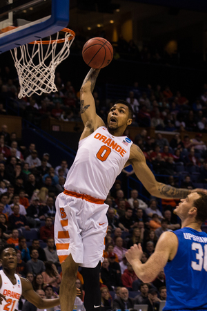 Michael Gbinije scored 23 points to help lead Syracuse to a 75-50 win over Middle Tennessee to go to the Sweet 16. 