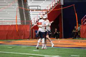 Syracuse's players had plenty to celebrate in a big win over Colgate that should lock up an NCAA tournament berth.