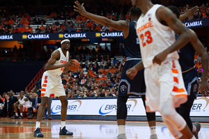 Paschal Chukwu holds the ball at the top of the key in Syracuse's loss to Old Dominion.