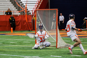 Drake Porter attempts to save a ball from going into the goal.