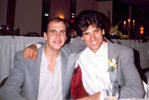 Sam Lloyd (left) sits with his former college roommate George Miserlis. The two first met at a meet-and-greet at the beginning of their freshman year at SU.