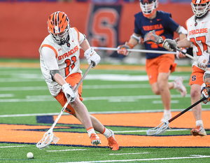 Brett Kennedy picks up a ground ball at his new position in 20-10 win over Virginia. 