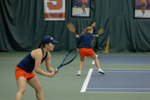 Syracuse won three singles and two doubles matches to defeat Louisville 4-3.