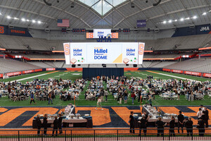 To celebrate Passover, Syracuse Hillel hosts the night Seder on Monday, April 22 at the JMA Wireless Dome. Syracuse Hillel is an on-campus religious organization that inspires and enriches the lives of Jewish students at Syracuse University.
