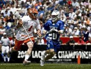 Pat Perritt controls the ball against a Duke defender. Perritt scored four goals, a career high, in Syracuse's 17-7 win Saturday in the final four over the Blue Devils.