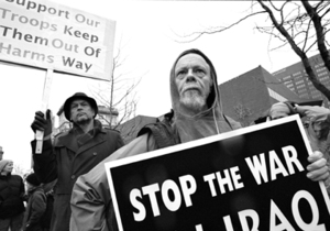 Mayer Shevin (front) and Edward Pospiech (behind) protest against the war in Clinton Square on Thursday.