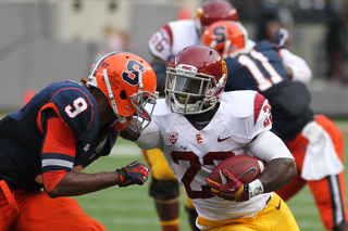 USC Trojans running back Curtis McNeal #22 tries to get around Syracuse Orange cornerback Ri'Shard Anderson #9