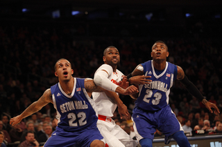 James Southerland muscles for position with Seton Hall's Brian Oliver (left) and Fuquan Edwin (right).