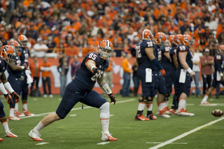 SU tight end Beckett Wales directs the offense out wide as the Orange's offensive line gets set.