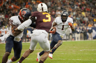 Ashton Broyld follows his blocker to the outside.