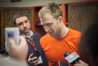 Cooney talks to reporters after finishing with 17 points. Cooney has hit exactly five 3s in four of five games for SU. 