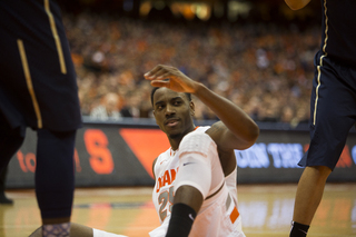 Rakeem Christmas smirks after getting flattened by Pitt center Talib Zanna.