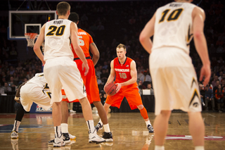 Cooney prepares to attack the defense as McCullough looks to set a screen.