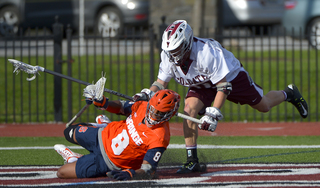 Hakeem Lecky takes a tumble on the turf. 