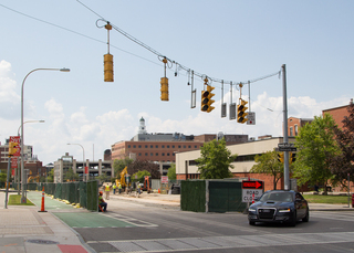 A car turns onto Waverly Avenue as work continues on the street's utility project. Waverly Avenue is expected to reopen to traffic by Aug. 18. Photo taken Aug. 1, 2017