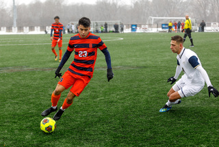 Ryan Raposo runs with the ball. He had early opportunities to score, but couldn't convert.