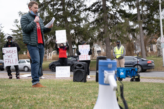 Collin Chambers speaks to demonstrators at the rally against anti-Asian violence in Thornden Park.