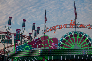 People ride the Super Himalaya, a popular ride featured at the New York State Fair. 