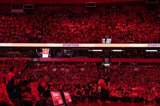 The largest crowd at a basketball game this season with 31,063 fills the Loud House. Orange lights illuminated the crowd as fans welcomed the team to the court.